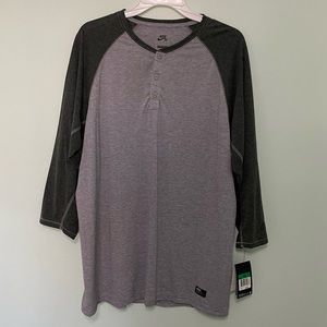 Brand new Nike Mens 3 button baseball shirt. Very soft material.